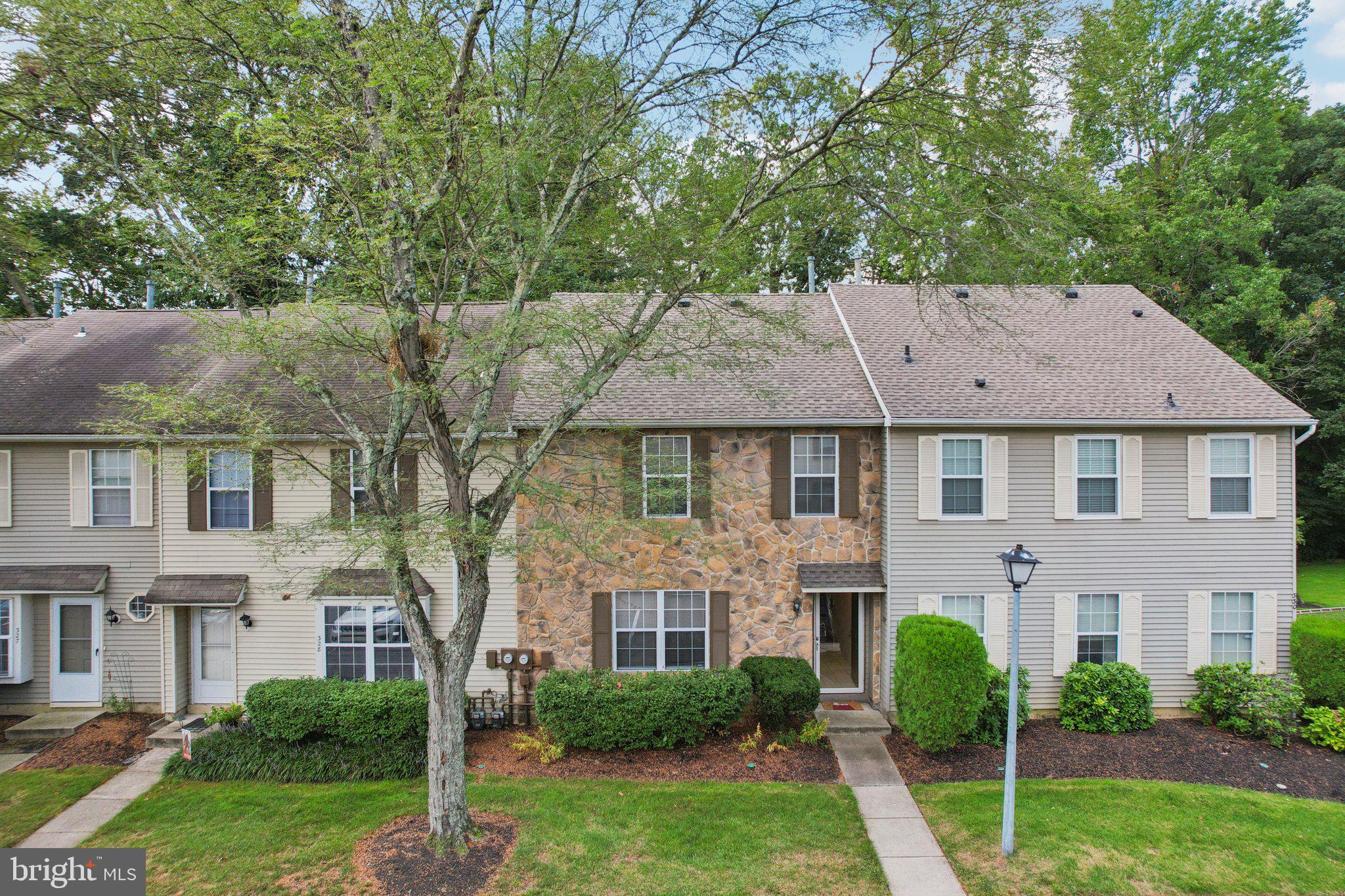 329 Gwynedd Court Mount Laurel, NJ 08054 - Photo 6 of 52 front view of a house with a yard