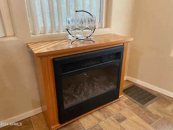 a stove top oven sitting inside of a kitchen