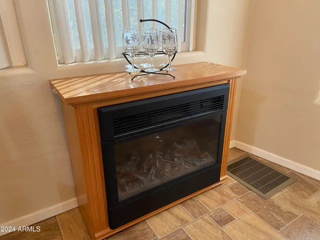a kitchen with a stove a sink and a refrigerator
