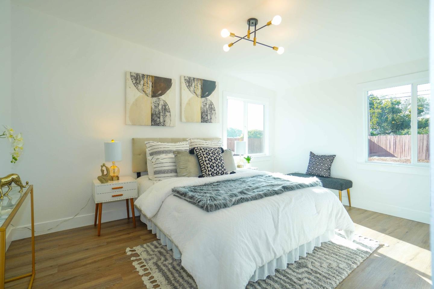 75 Lawton Drive Milpitas, CA 95035 - Photo 15 of 32 a bedroom with a bed and wooden floor