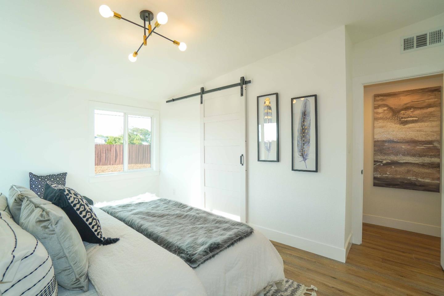 75 Lawton Drive Milpitas, CA 95035 - Photo 16 of 32 a bedroom with a bed and a dresser