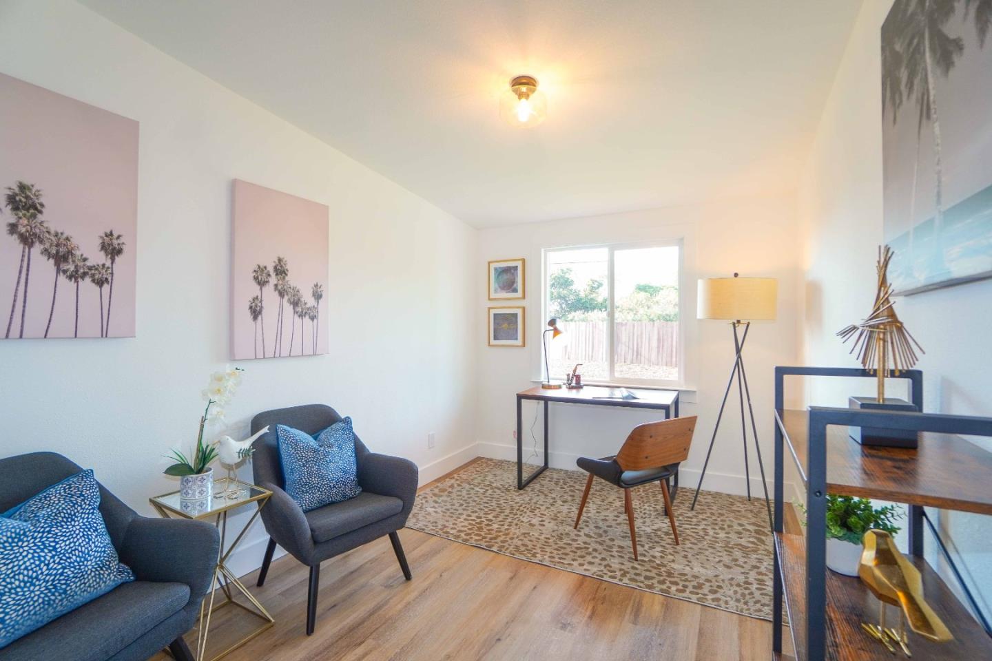 75 Lawton Drive Milpitas, CA 95035 - Photo 18 of 32 a living room with furniture and a wooden floor
