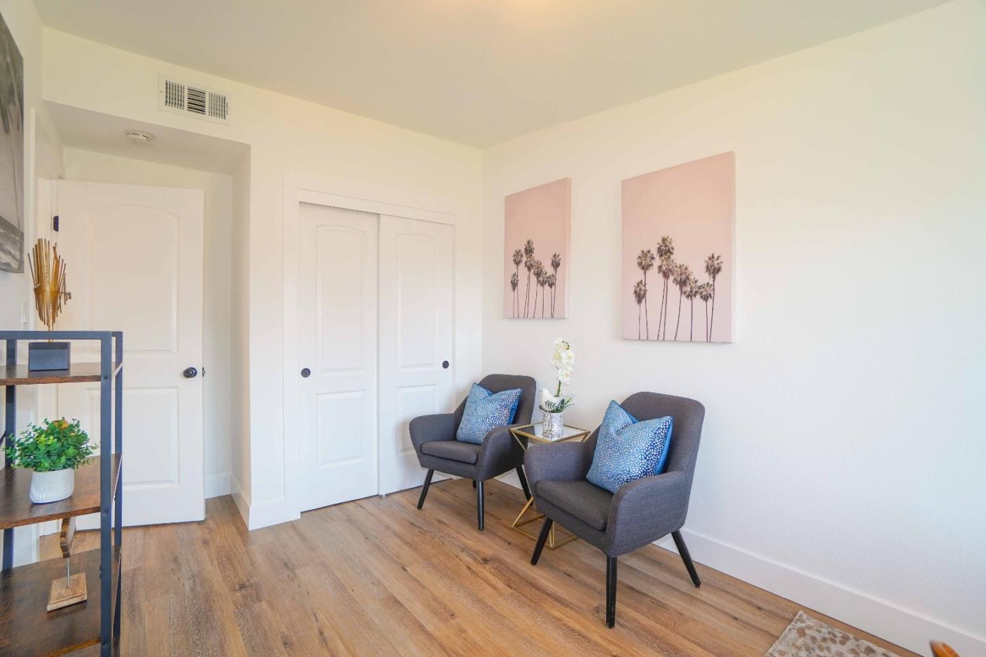 75 Lawton Drive Milpitas, CA 95035 - Photo 19 of 32 a workspace room with furniture and wooden floor