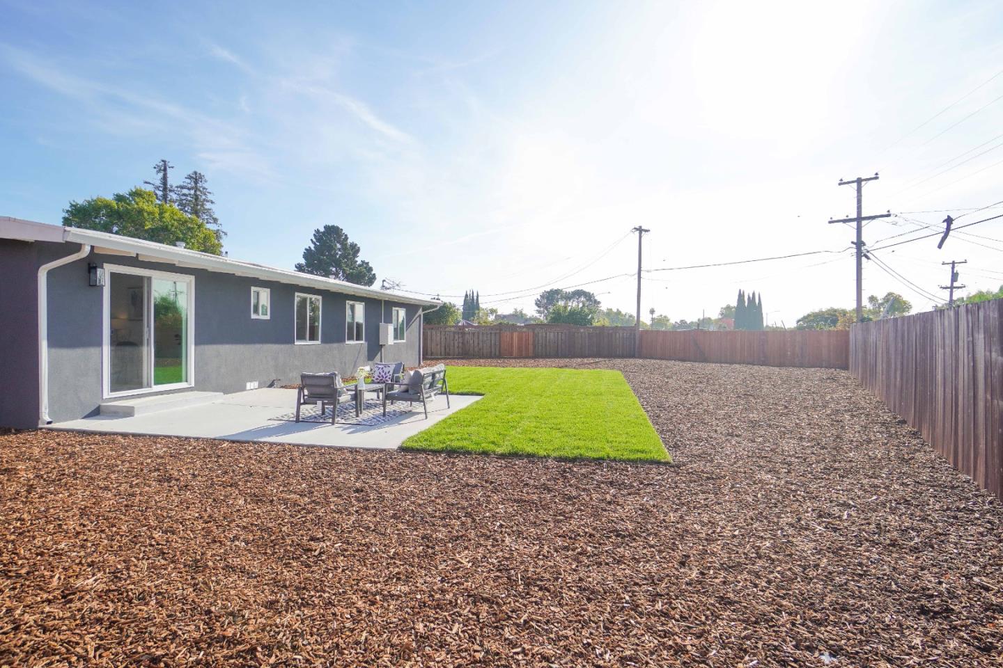 75 Lawton Drive Milpitas, CA 95035 - Photo 27 of 32 a view of a house with backyard and sitting area