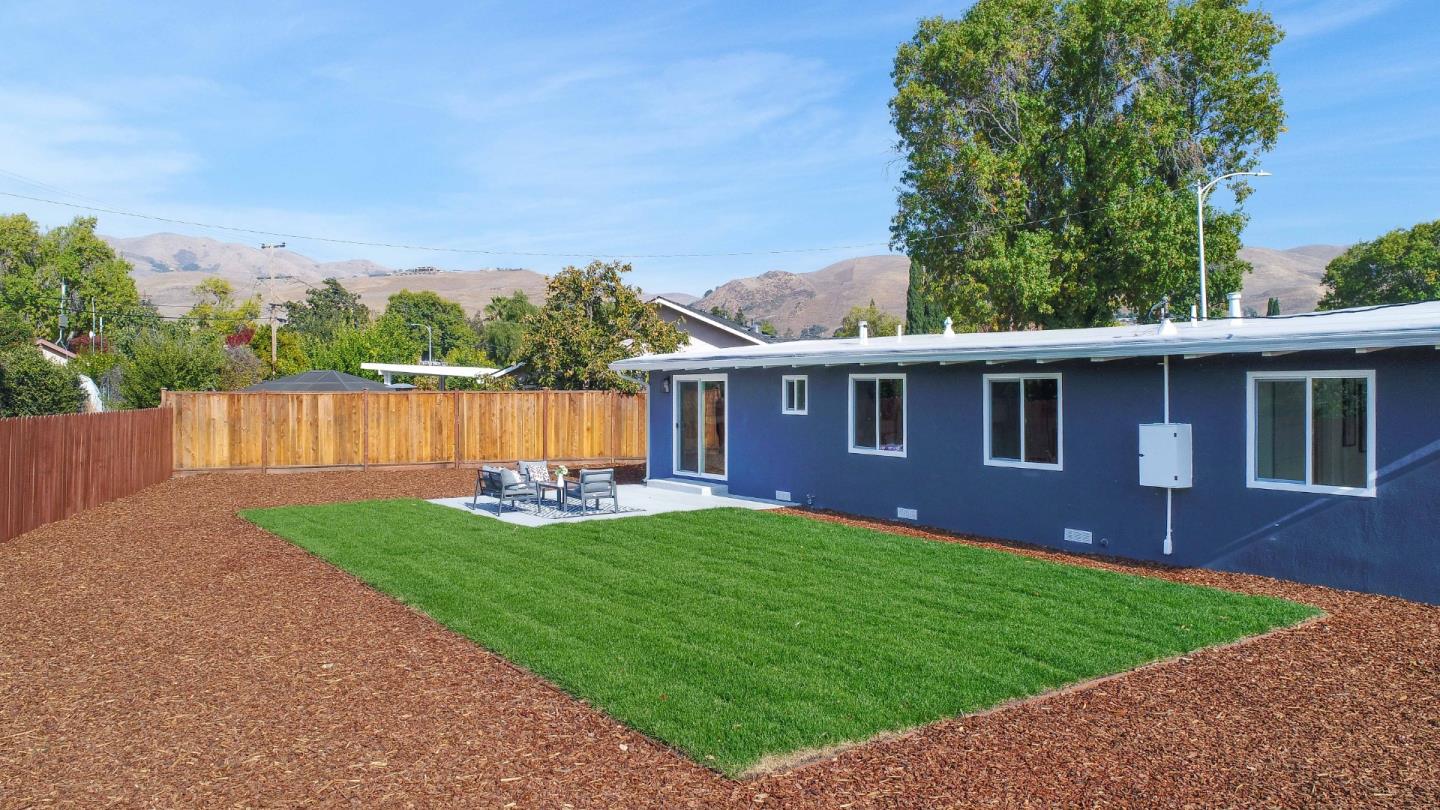 75 Lawton Drive Milpitas, CA 95035 - Photo 30 of 32 a view of house with a yard