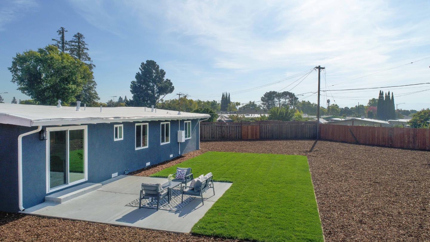 75 Lawton Drive Milpitas, CA 95035 - Photo 31 of 32 a view of a house with a yard and furniture