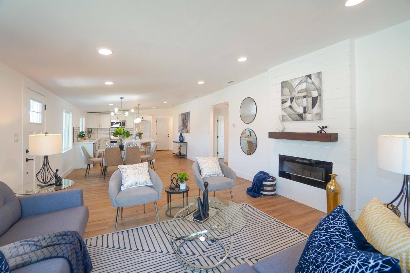 75 Lawton Drive Milpitas, CA 95035 - Photo 6 of 32 a living room with furniture and a fireplace