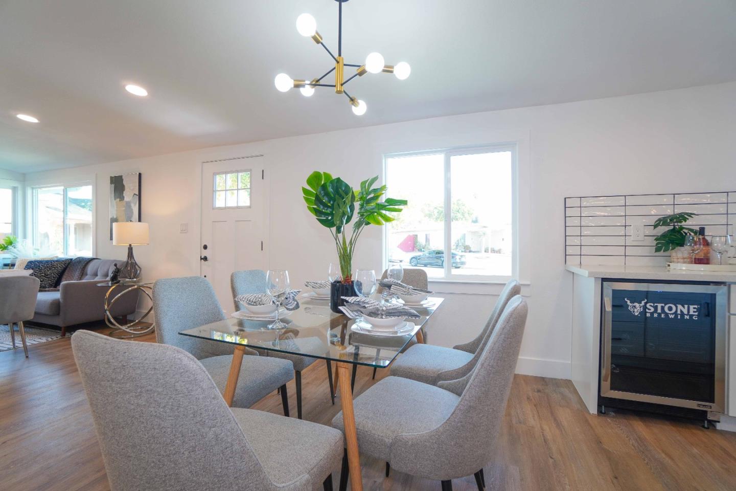 75 Lawton Drive Milpitas, CA 95035 - Photo 9 of 32 a view of a dining room with furniture window and wooden floor