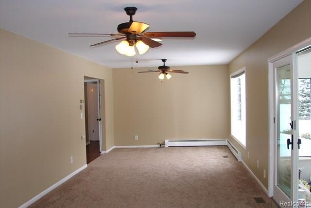 1426 Pebble Creek Road Metamora, MI 48455 - Photo 12 of 24 Spacious living room.jpg