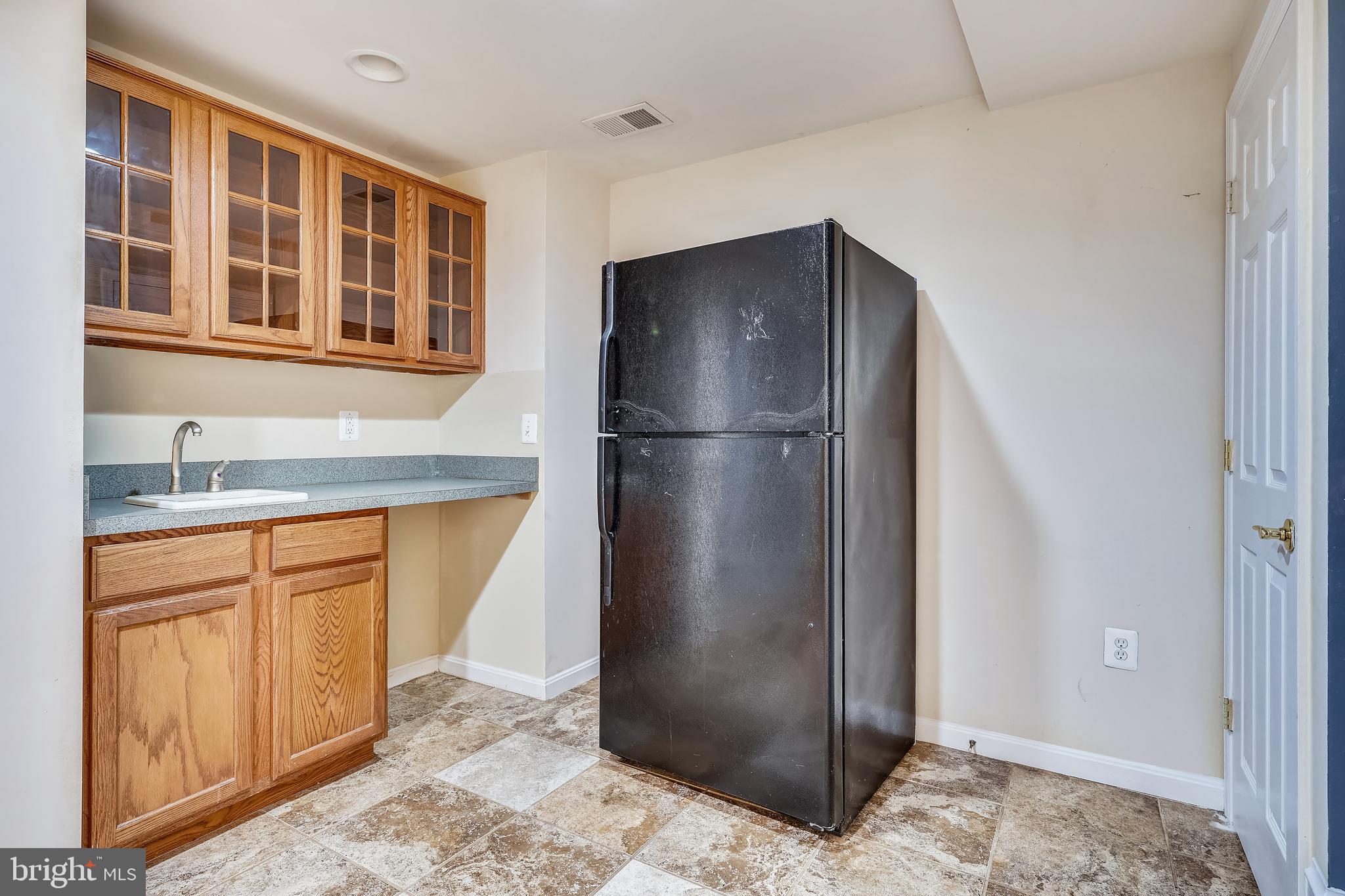 8287 Laurel Heights Loop Lorton, VA 22079 - Photo 44 of 50 Lower Level Bar area with Refrigerator