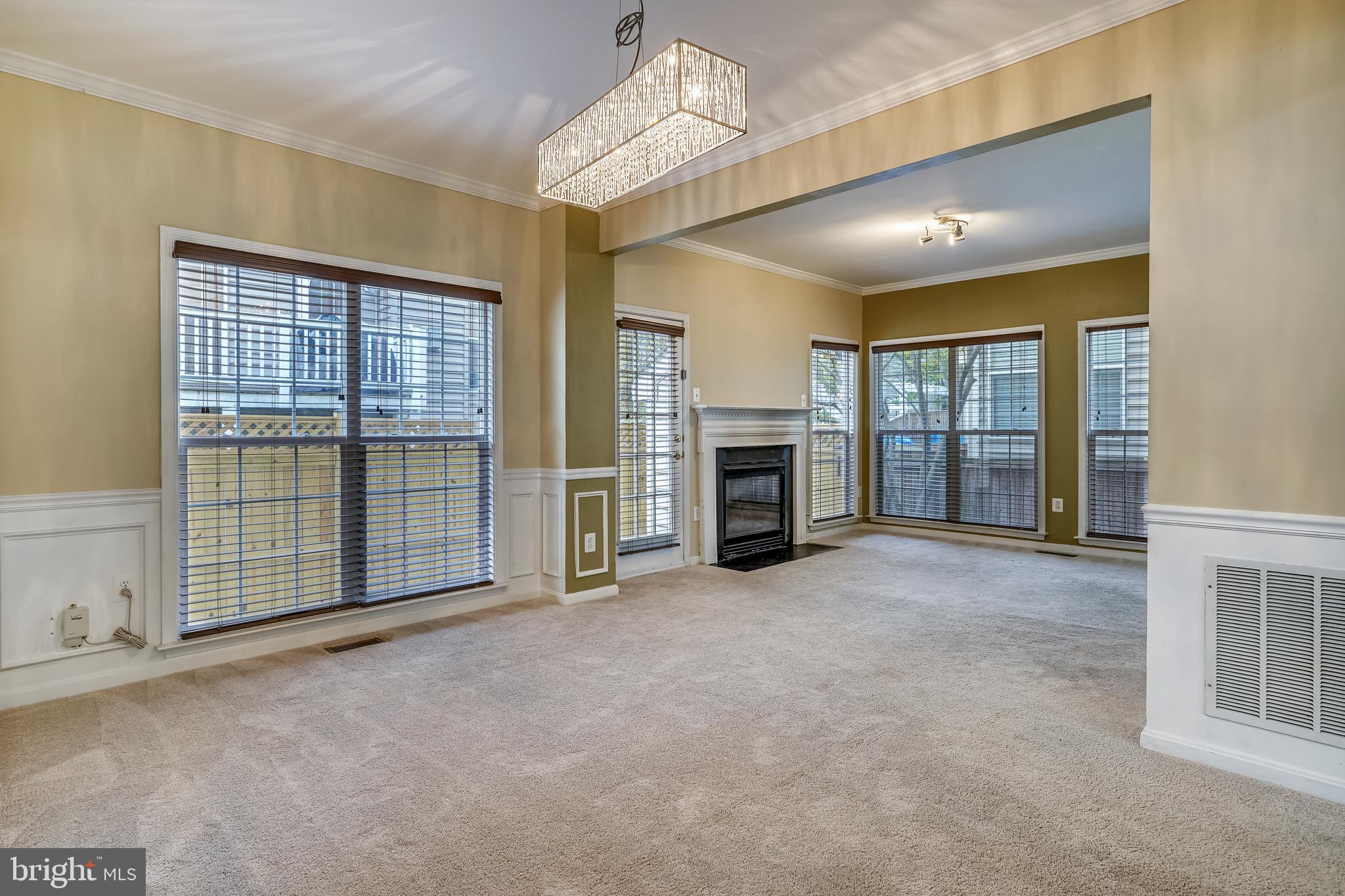 8287 Laurel Heights Loop Lorton, VA 22079 - Photo 4 of 50 Main level Family Room with gas fireplace