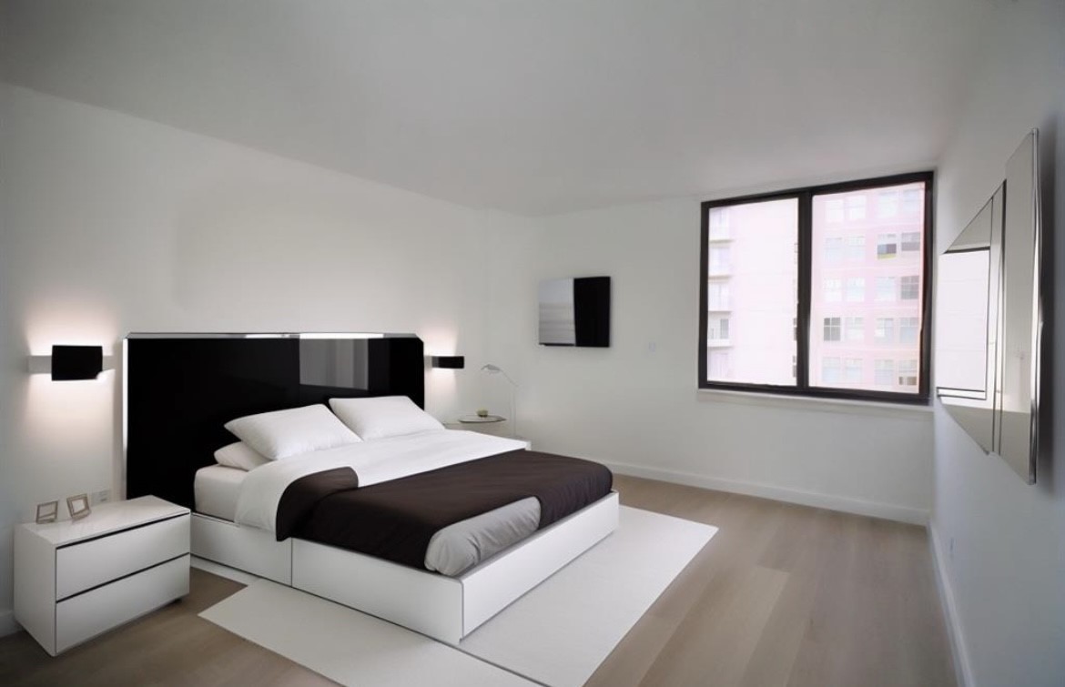 3525 Sage Road, Unit 1213 Houston, TX 77056 - Photo 12 of 26 a bedroom with a bed and a window