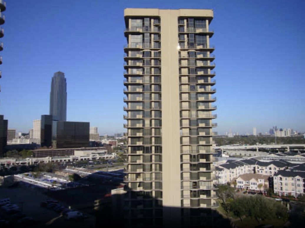 3525 Sage Road, Unit 1213 Houston, TX 77056 - Photo 22 of 26 a view of a city with tall buildings