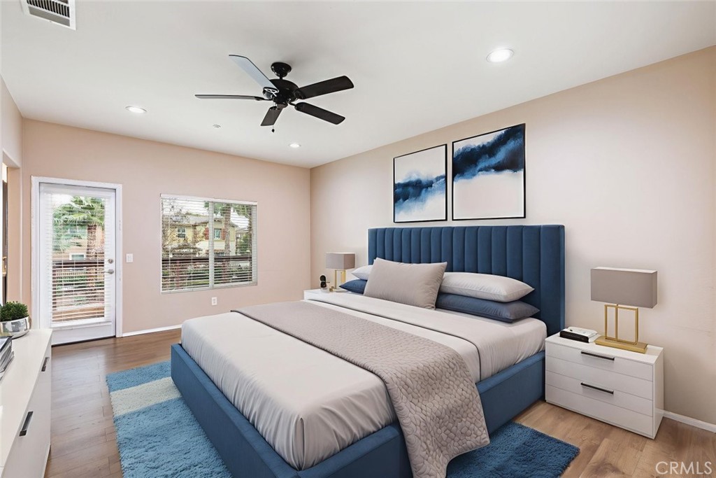 6228 Manzanita Way Riverside, CA 92504 - Photo 16 of 42 a bedroom with bed and window