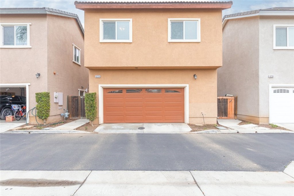 6228 Manzanita Way Riverside, CA 92504 - Photo 32 of 42 a front view of a house with a garage