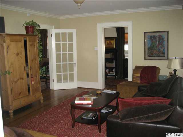 3208 Willow Oak Road Charlotte, NC 28209 - Photo 3 of 8 a living room with furniture and a window