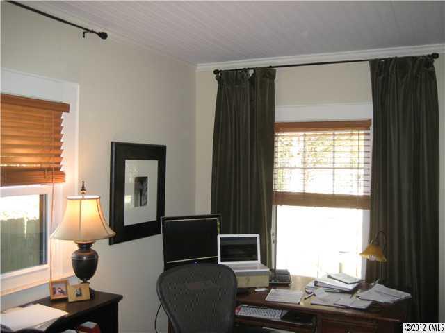 3208 Willow Oak Road Charlotte, NC 28209 - Photo 7 of 8 a living room with furniture and a window