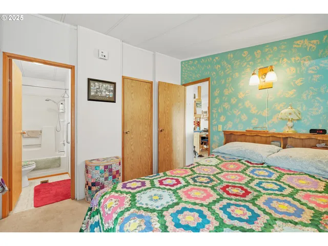 a bedroom with furniture and a bed