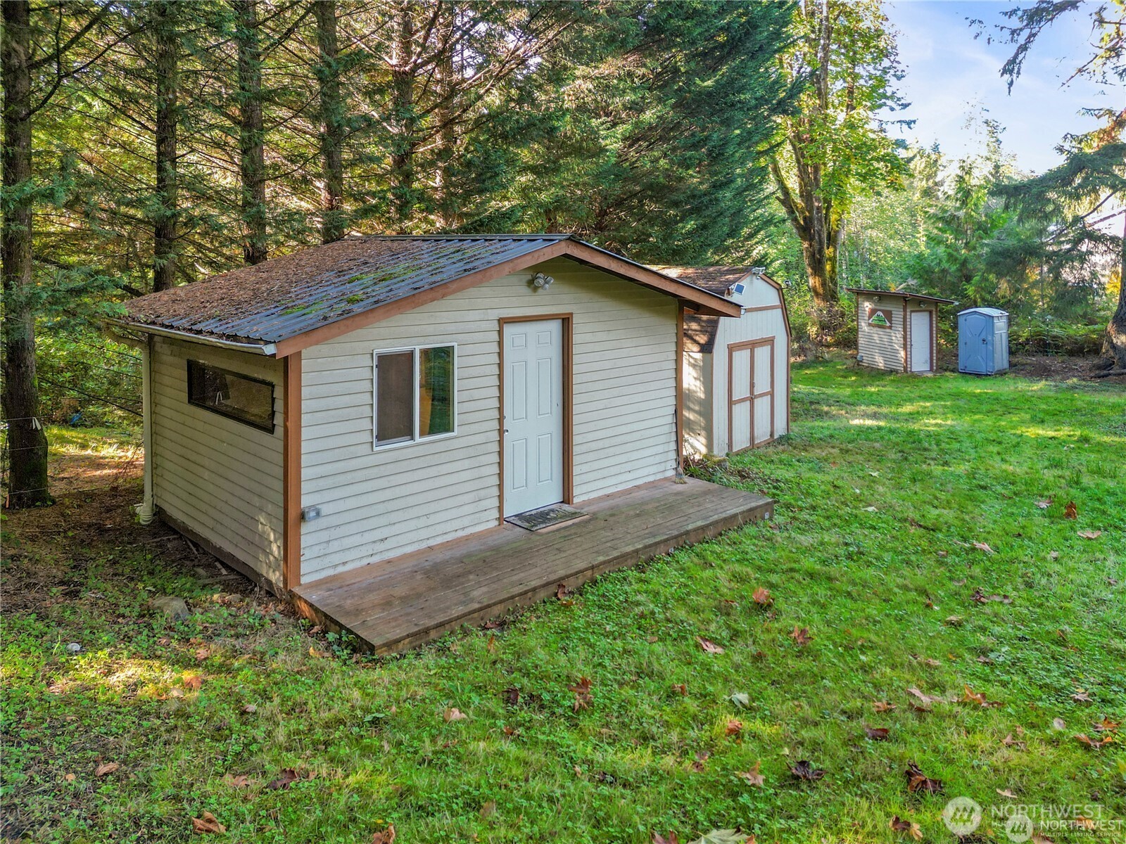 14310 200th Avenue Southeast Renton, WA 98058 - Photo 7 of 39 a house view with a garden space