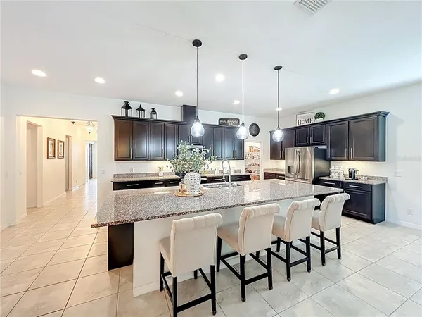 a view of a hallway with a living room