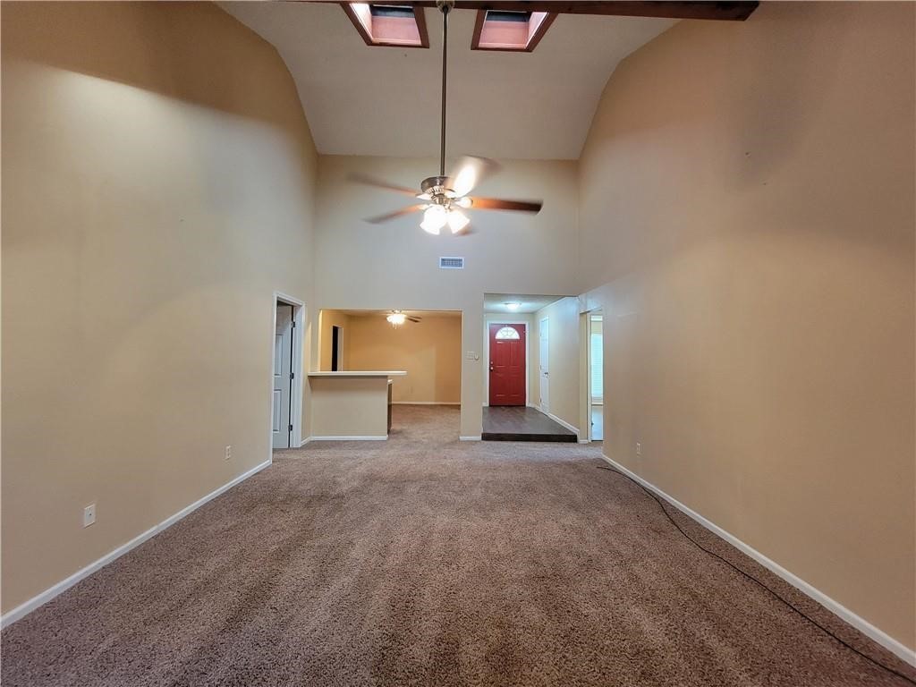 5201 Snowgoose Road Corpus Christi, TX 78413 - Photo 4 of 21 a view of a livingroom with a ceiling fan window and hardwood floor