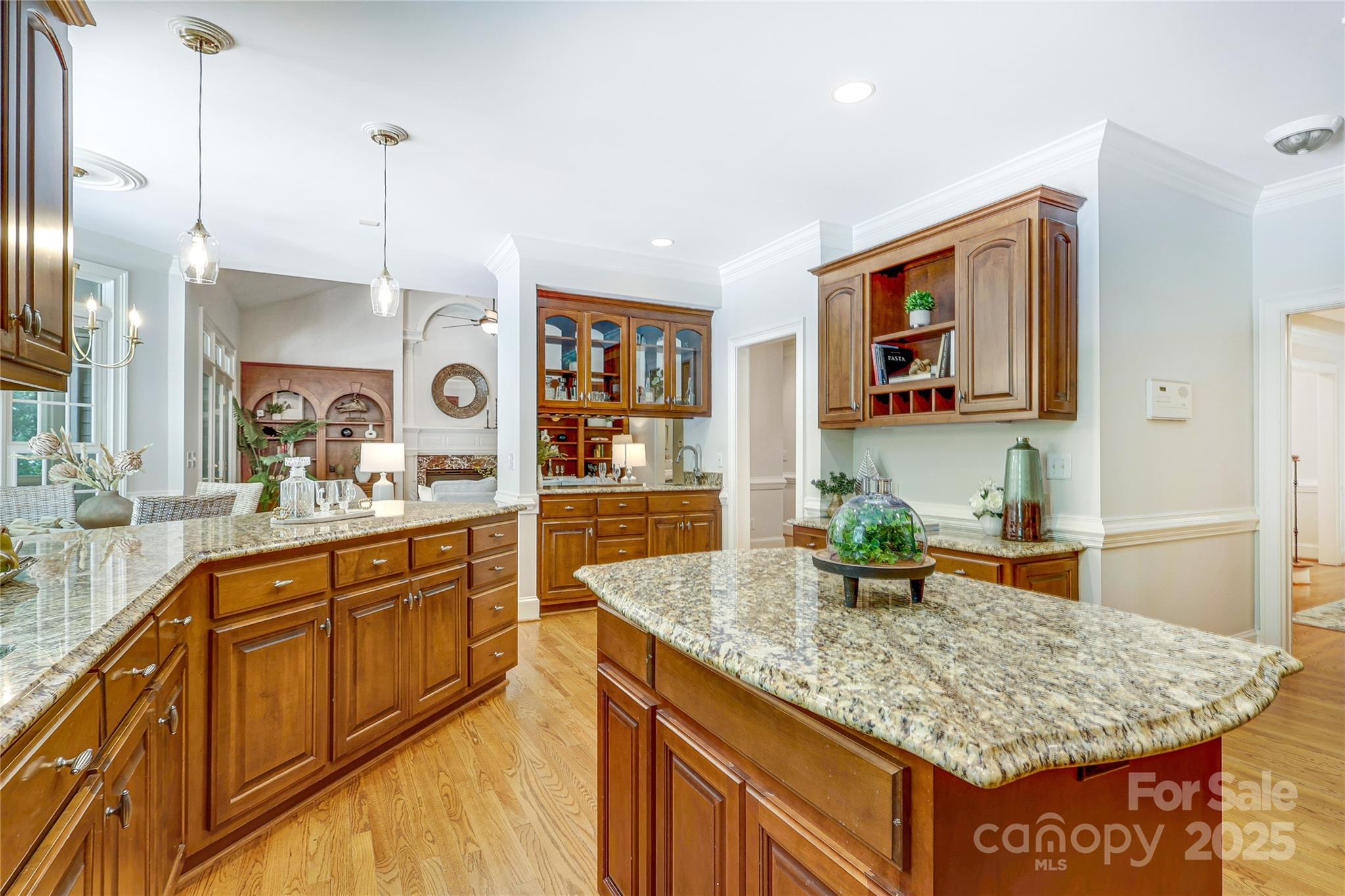 2500 High Ridge Road Charlotte, NC 28270 - Photo 16 of 47 a kitchen with stainless steel appliances granite countertop a sink dishwasher and a wooden cabinets with large window