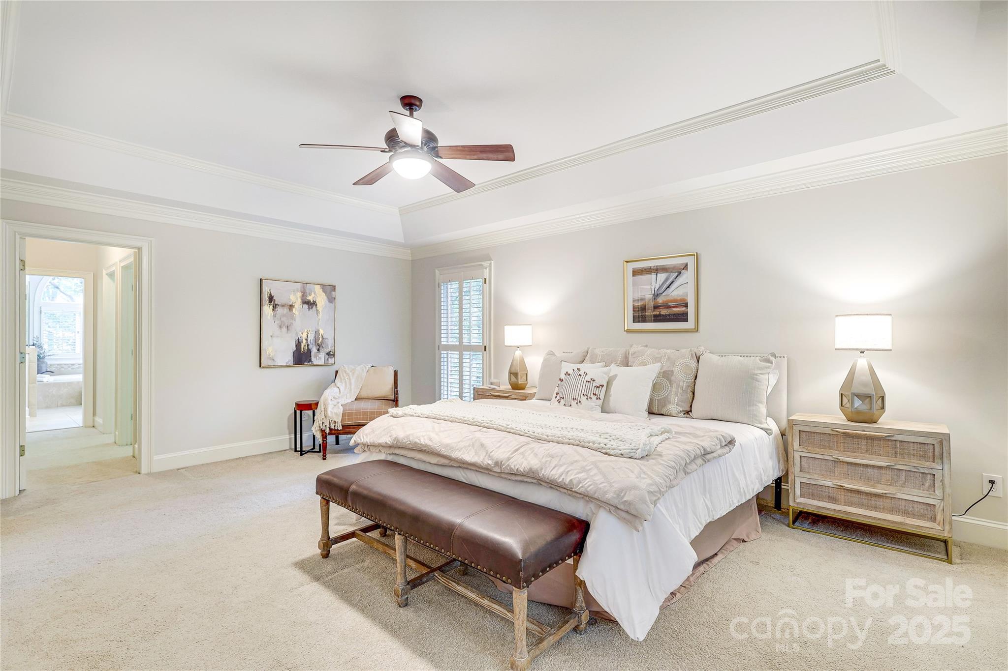 2500 High Ridge Road Charlotte, NC 28270 - Photo 22 of 47 a bedroom with a bed and a chandelier