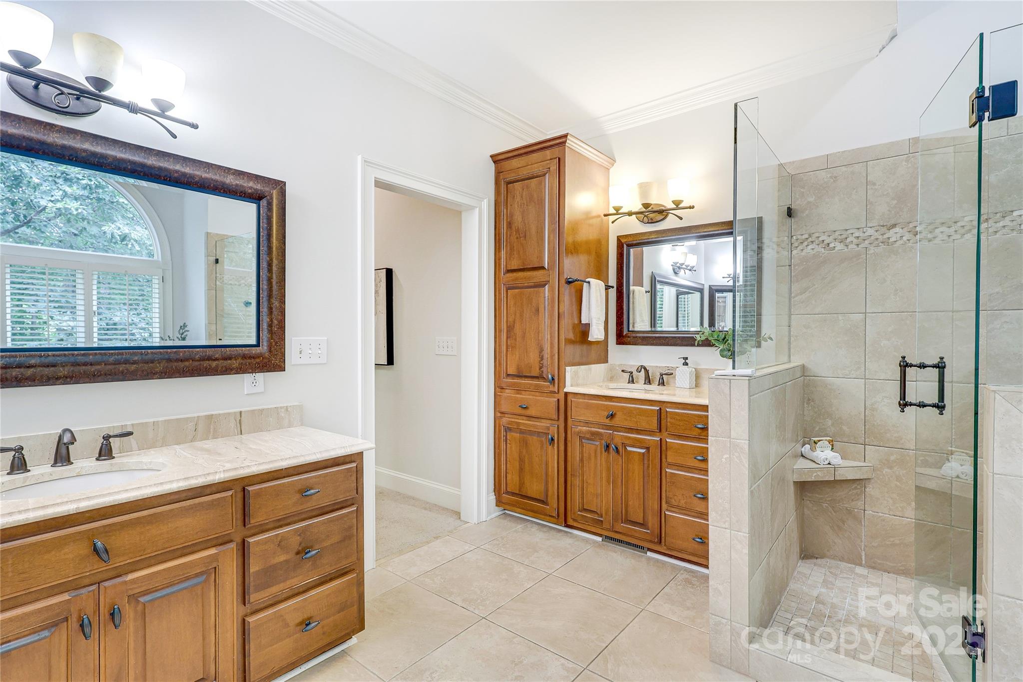 2500 High Ridge Road Charlotte, NC 28270 - Photo 28 of 47 a spacious bathroom with a shower sink and mirror