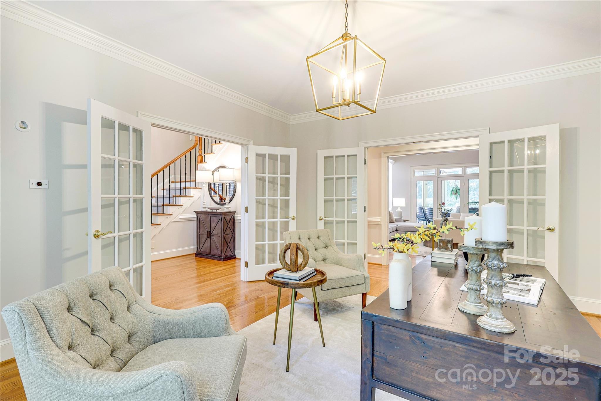 2500 High Ridge Road Charlotte, NC 28270 - Photo 5 of 47 a living room with fireplace furniture and a chandelier