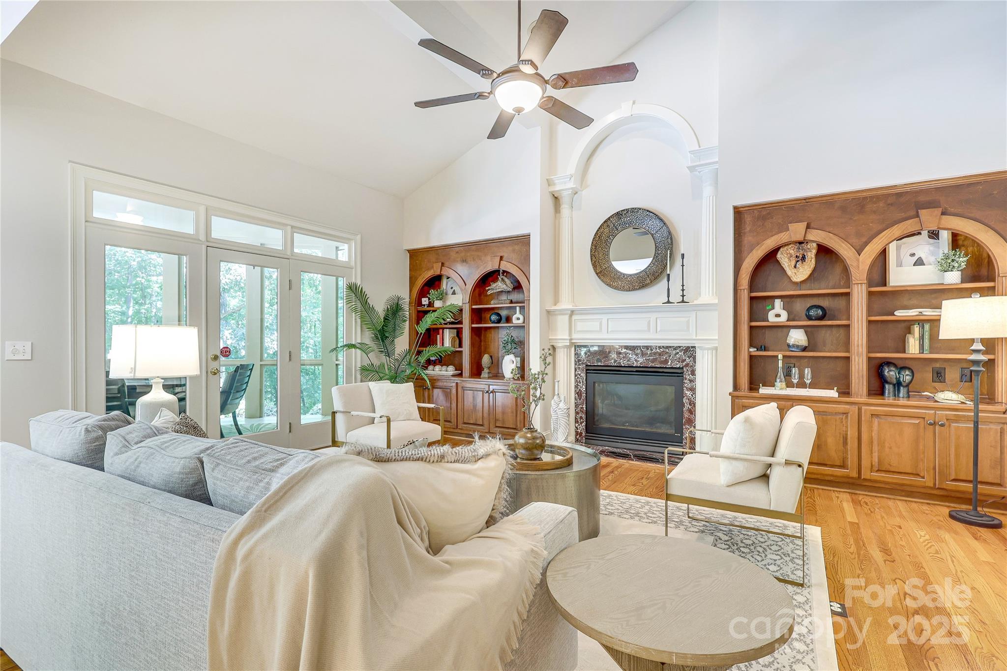 2500 High Ridge Road Charlotte, NC 28270 - Photo 7 of 47 a living room with furniture a fireplace and a large window