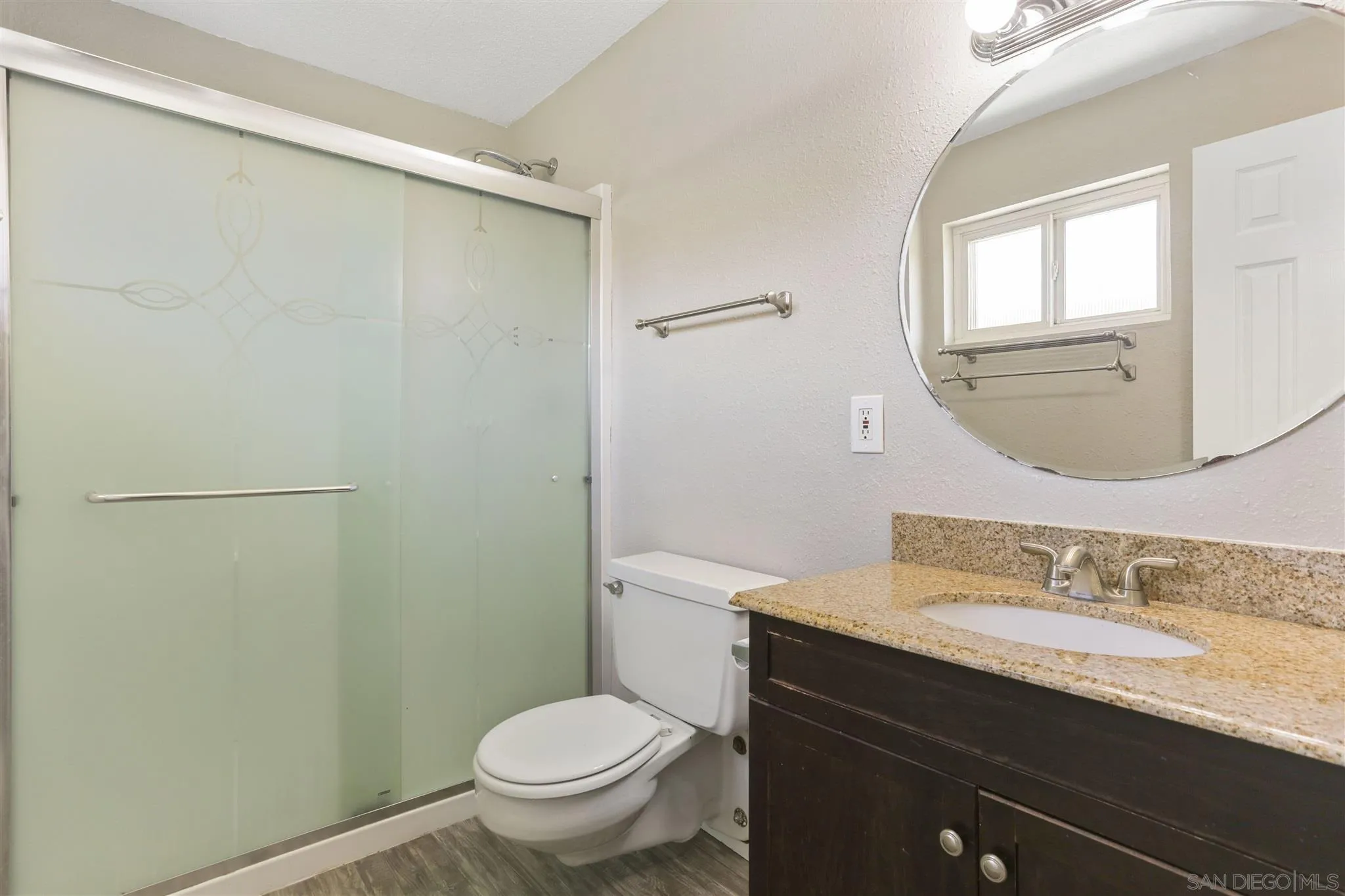 13726 Utopia Road Poway, CA 92064 - Photo 12 of 19 a bathroom with a granite countertop sink toilet and a mirror