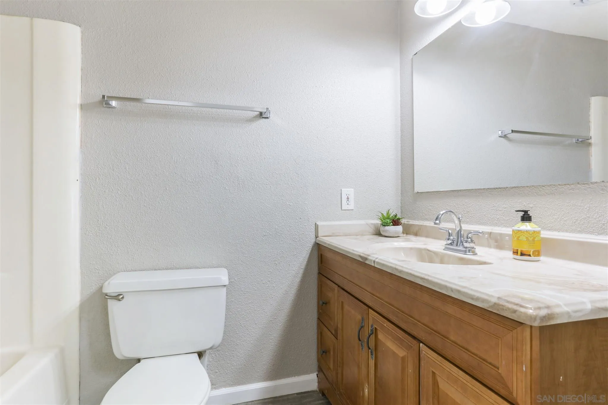 13726 Utopia Road Poway, CA 92064 - Photo 15 of 19 a bathroom with a granite countertop toilet sink and a mirror
