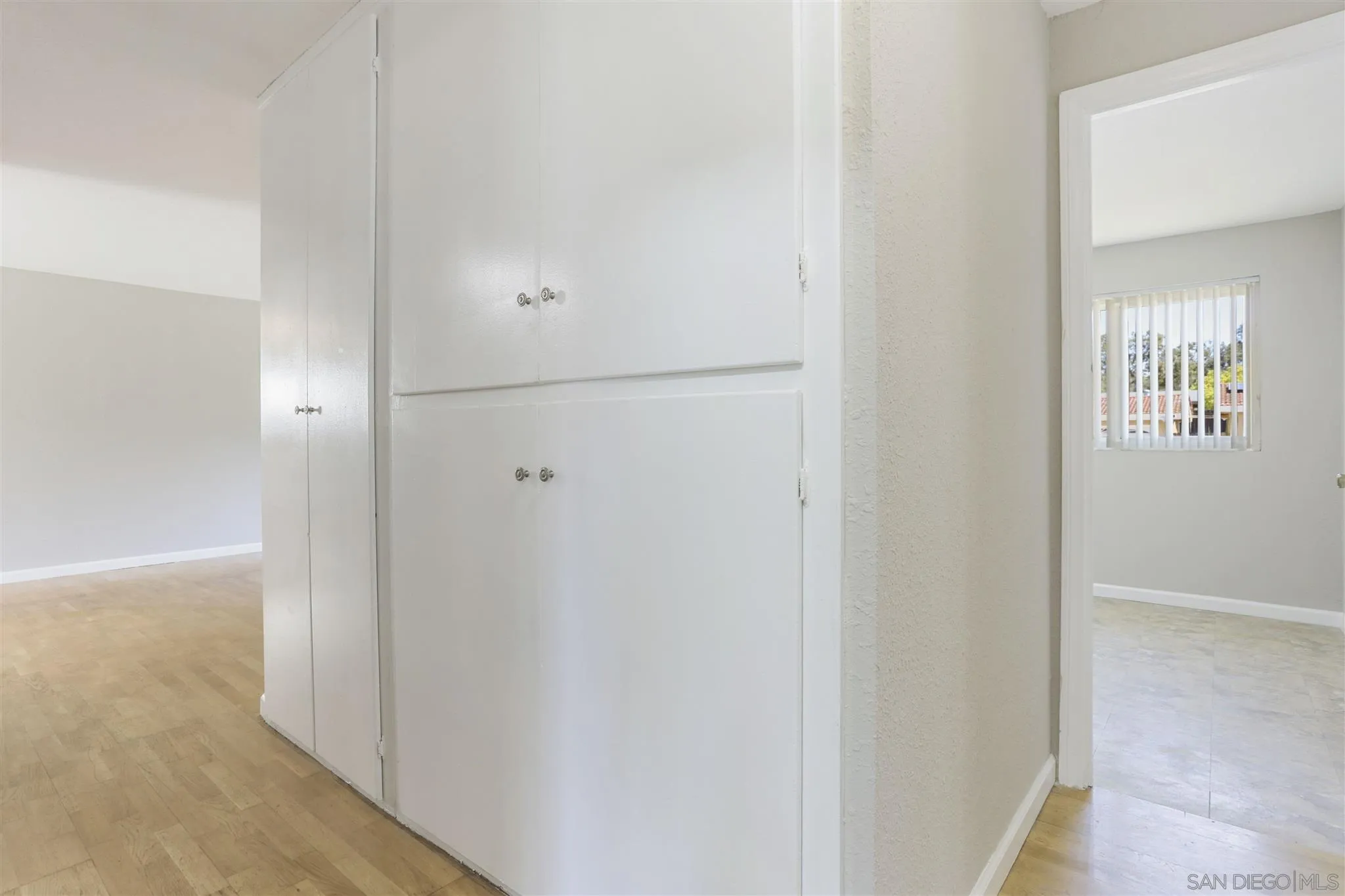 13726 Utopia Road Poway, CA 92064 - Photo 10 of 19 a view of a hallway with closet