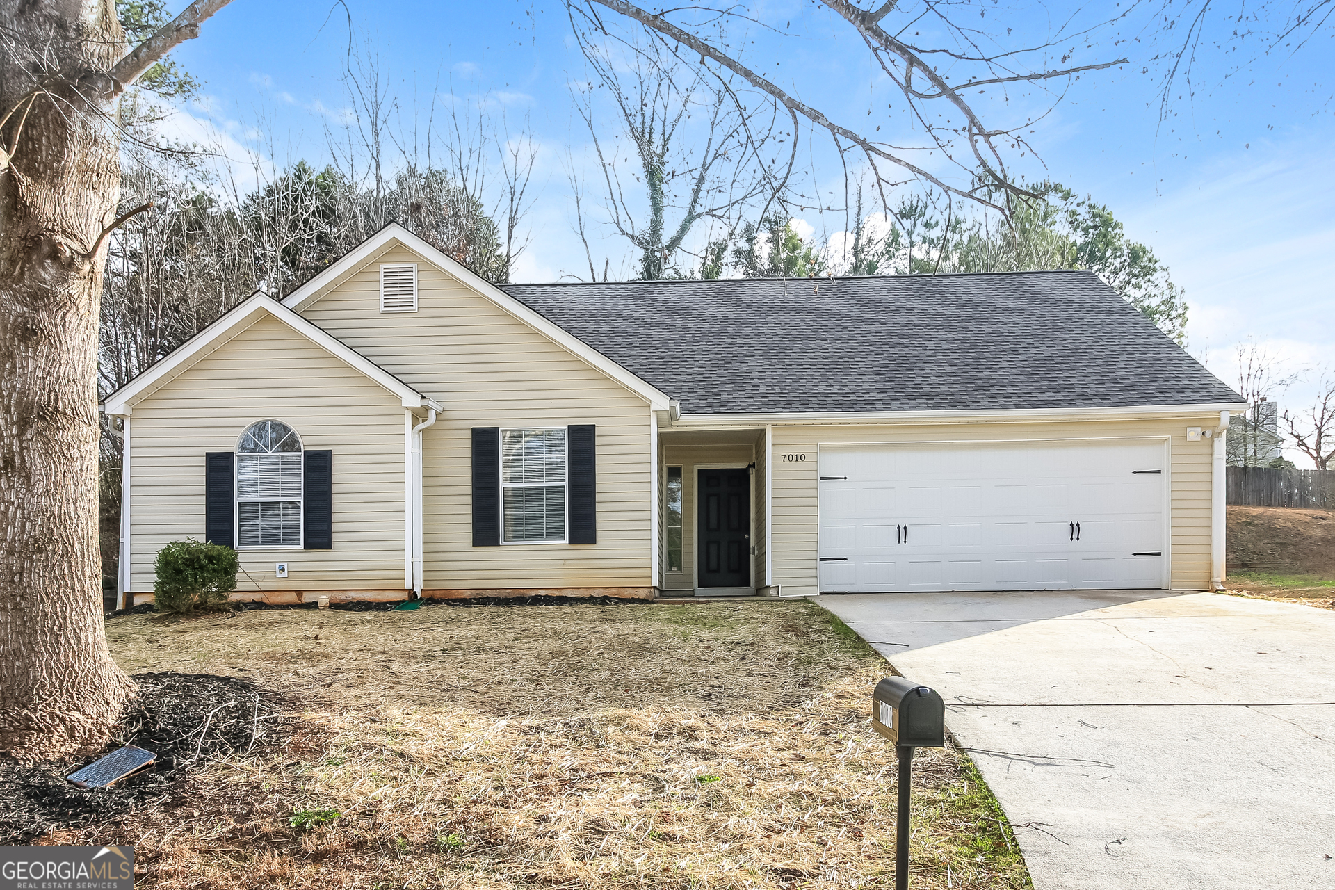 7010 New Dale Road Rex, GA 30273 - Photo 1 of 16 a view of a house with a yard