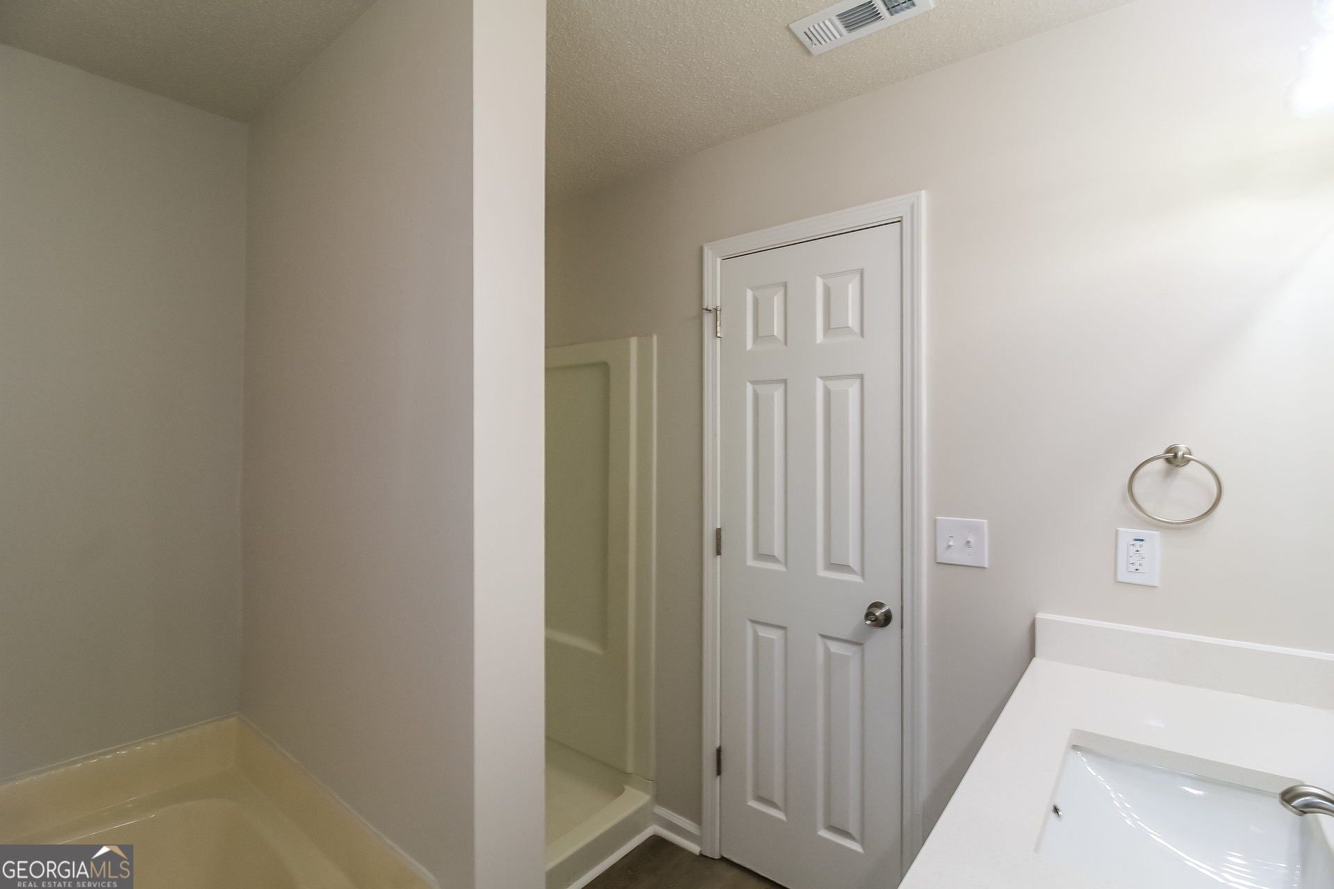 7010 New Dale Road Rex, GA 30273 - Photo 11 of 16 a view of a bathroom from the hallway