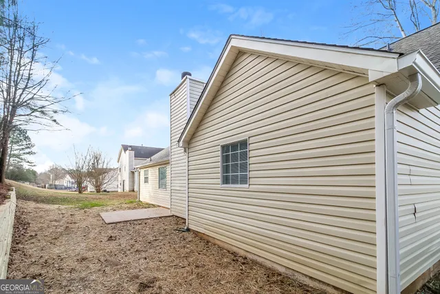 a view of a back yard of the house
