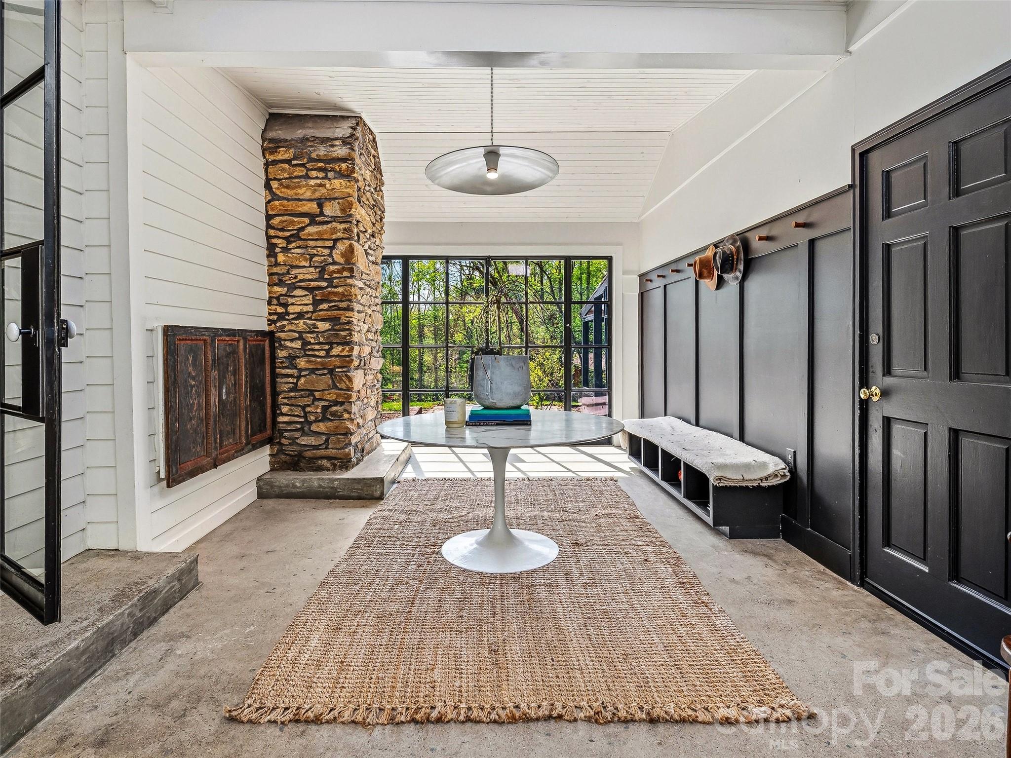 51 Mark Twain Road Asheville, NC 28805 - Photo 26 of 46 a view of an entryway with floor to ceiling windows