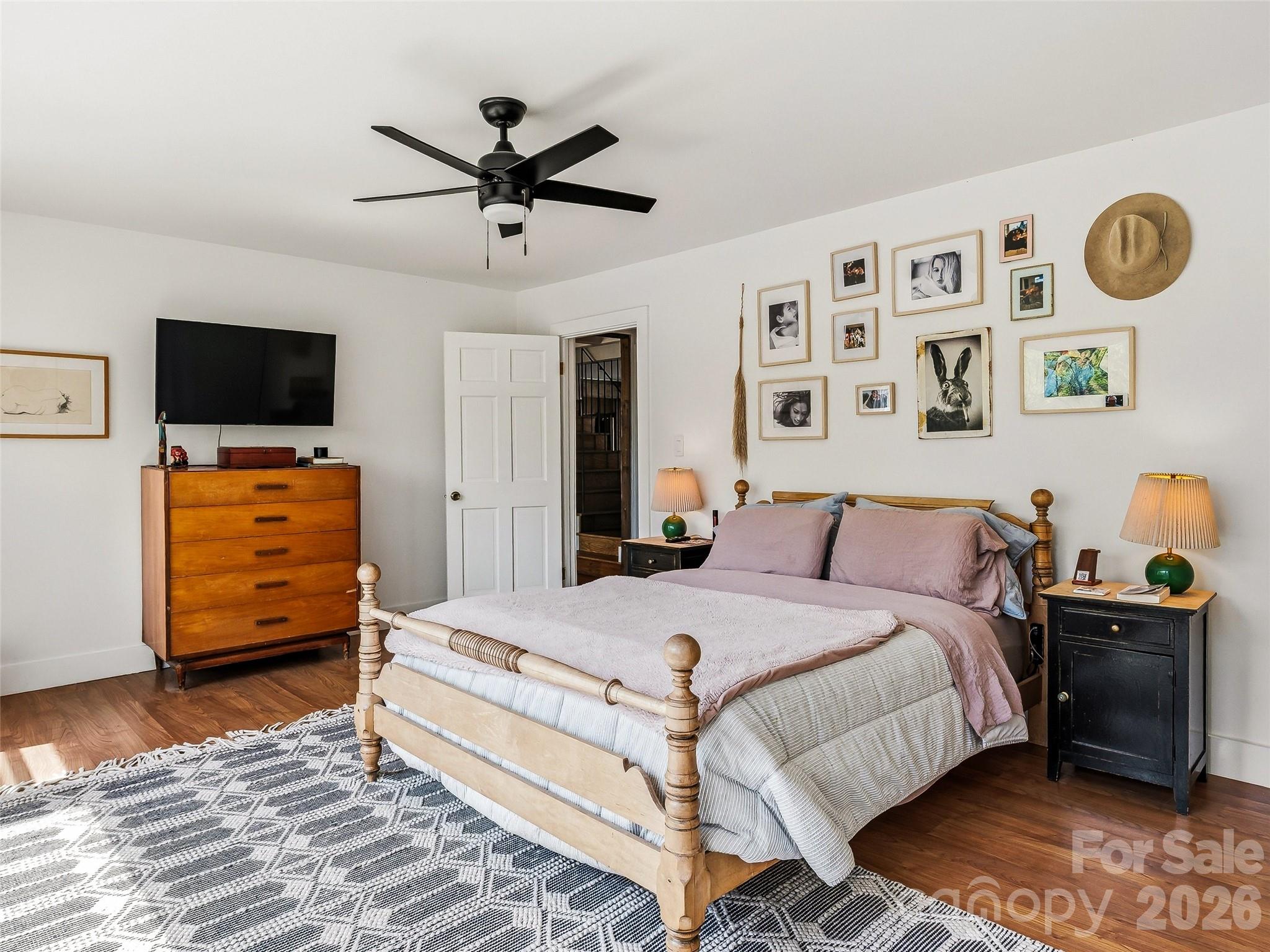 51 Mark Twain Road Asheville, NC 28805 - Photo 29 of 46 a bedroom with a bed and a television