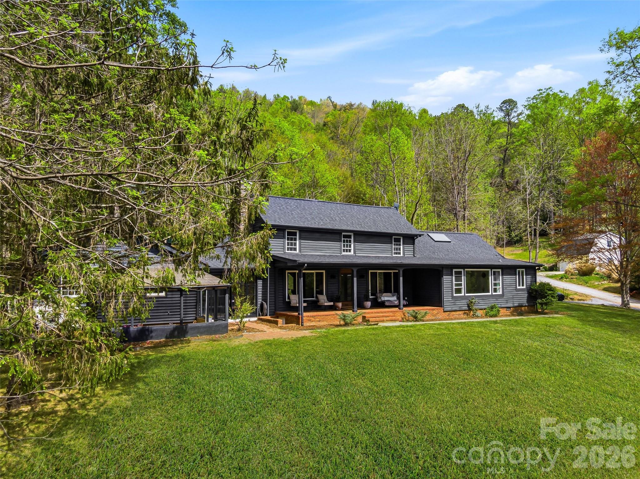 51 Mark Twain Road Asheville, NC 28805 - Photo 3 of 46 a view of a house with a yard