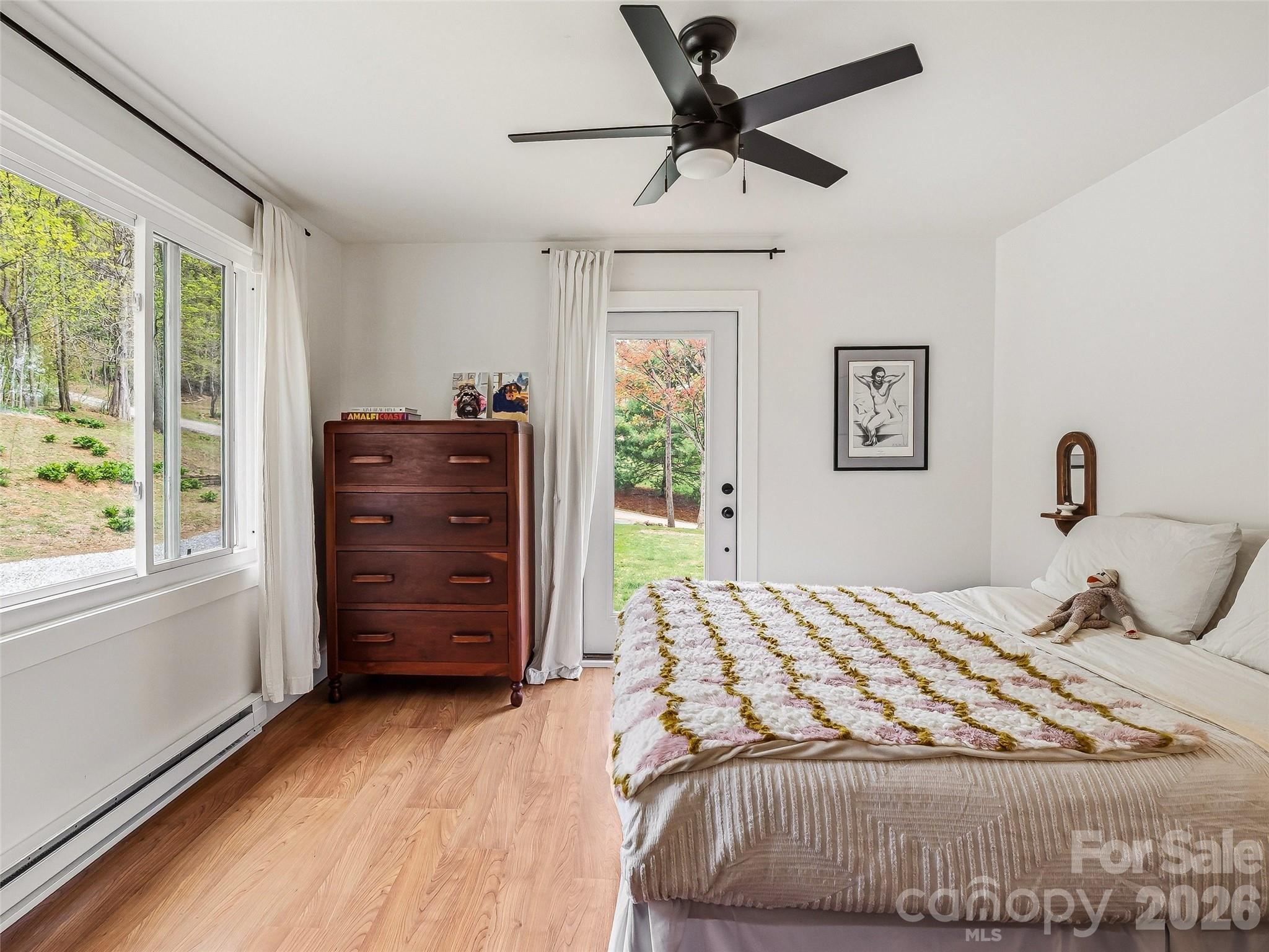 51 Mark Twain Road Asheville, NC 28805 - Photo 34 of 46 a bedroom with a bed and a window