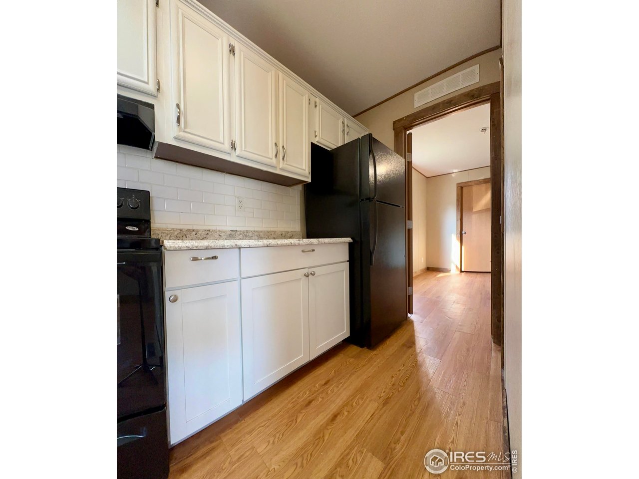 230 North 2nd Street, Unit 83 Berthoud, CO 80513 - Photo 23 of 50 Galley Kitchen