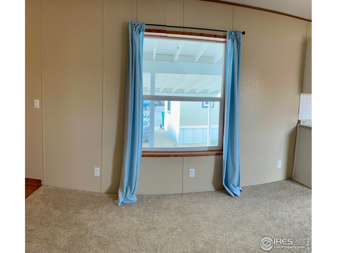 230 North 2nd Street, Unit 83 Berthoud, CO 80513 - Photo 25 of 50 View to Carport