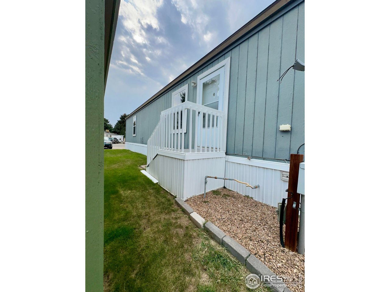230 North 2nd Street, Unit 83 Berthoud, CO 80513 - Photo 3 of 50 Side door