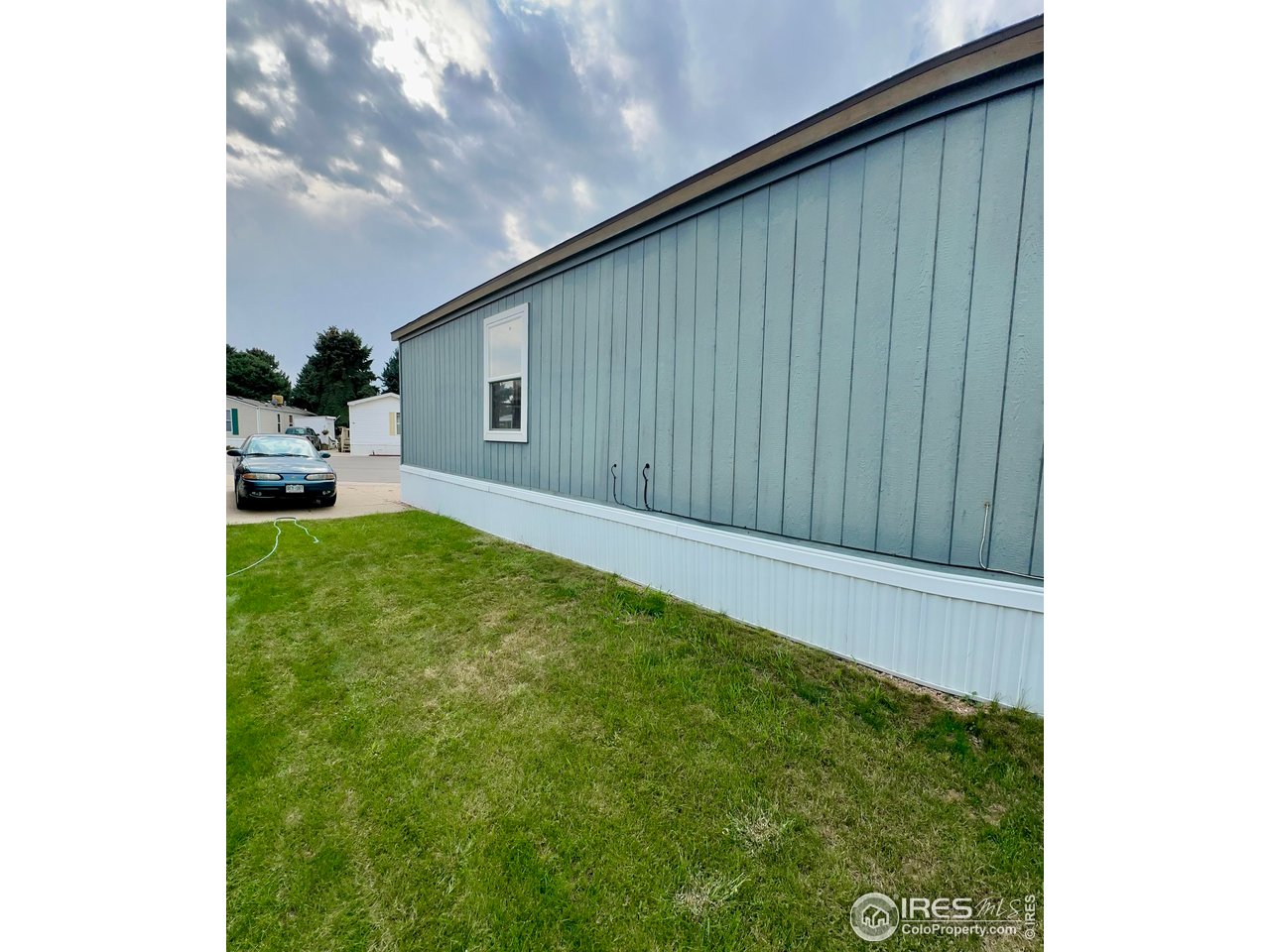 230 North 2nd Street, Unit 83 Berthoud, CO 80513 - Photo 4 of 50 Side