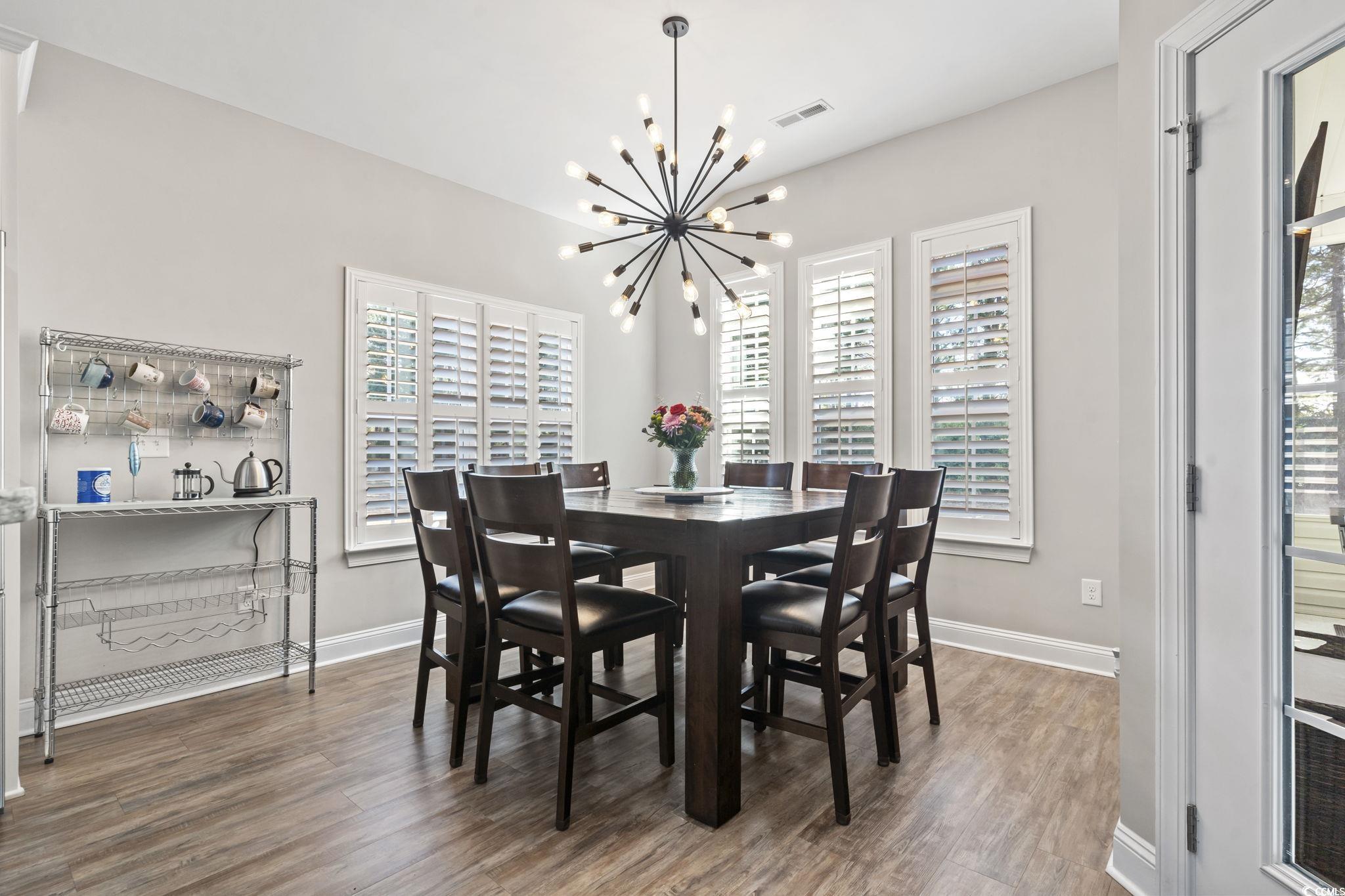 308 Turning Pines Loop Myrtle Beach, SC 29579 - Photo 11 of 33 Dining space with dark wood-type flooring and a no