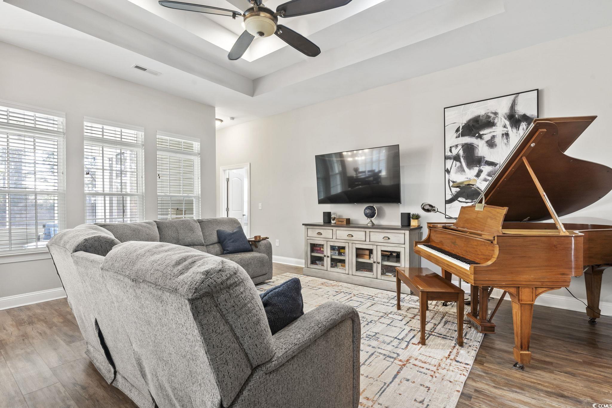 308 Turning Pines Loop Myrtle Beach, SC 29579 - Photo 15 of 33 Living room with ceiling fan, wood-type flooring,