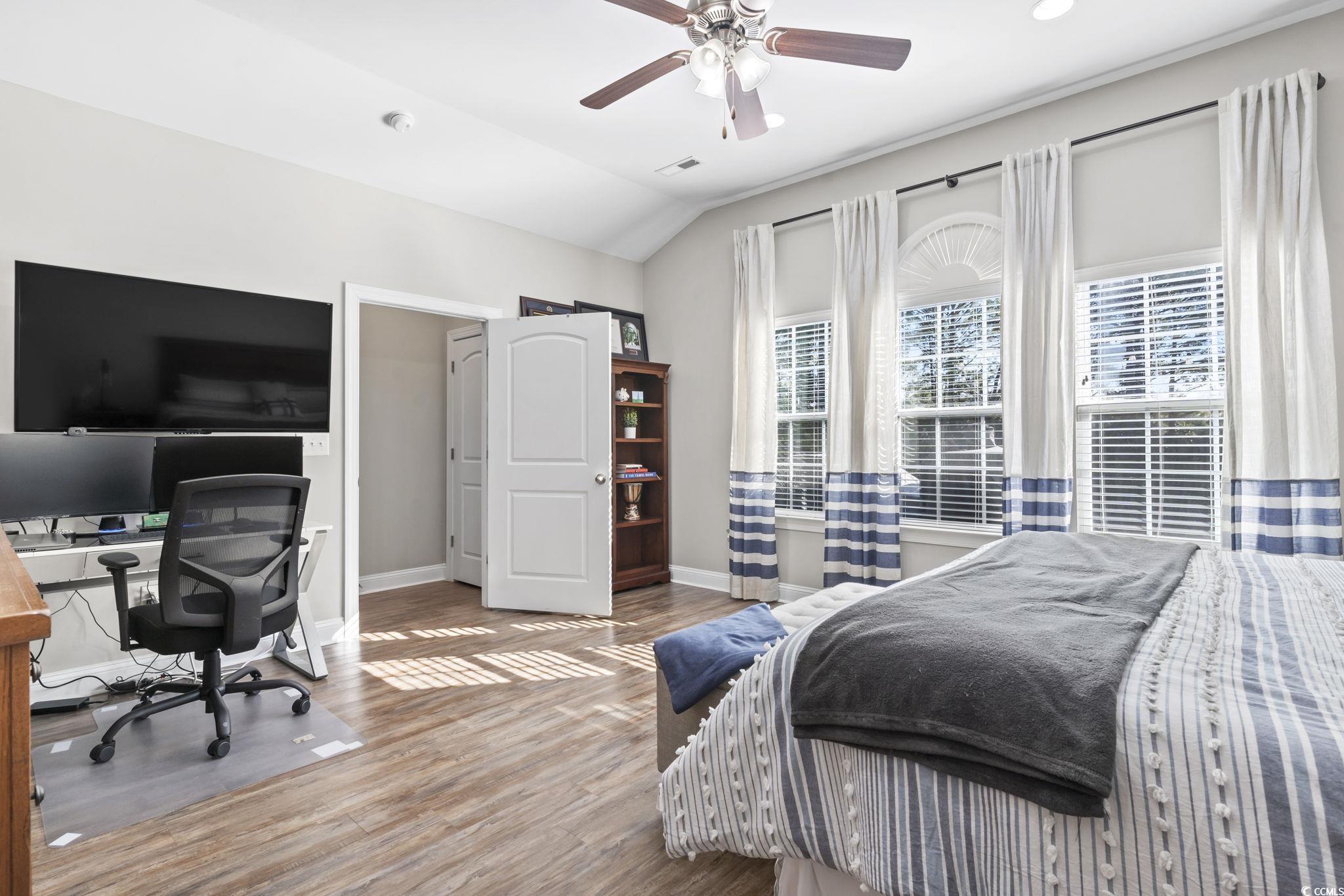 308 Turning Pines Loop Myrtle Beach, SC 29579 - Photo 17 of 33 Bedroom with ceiling fan, wood-type flooring, and
