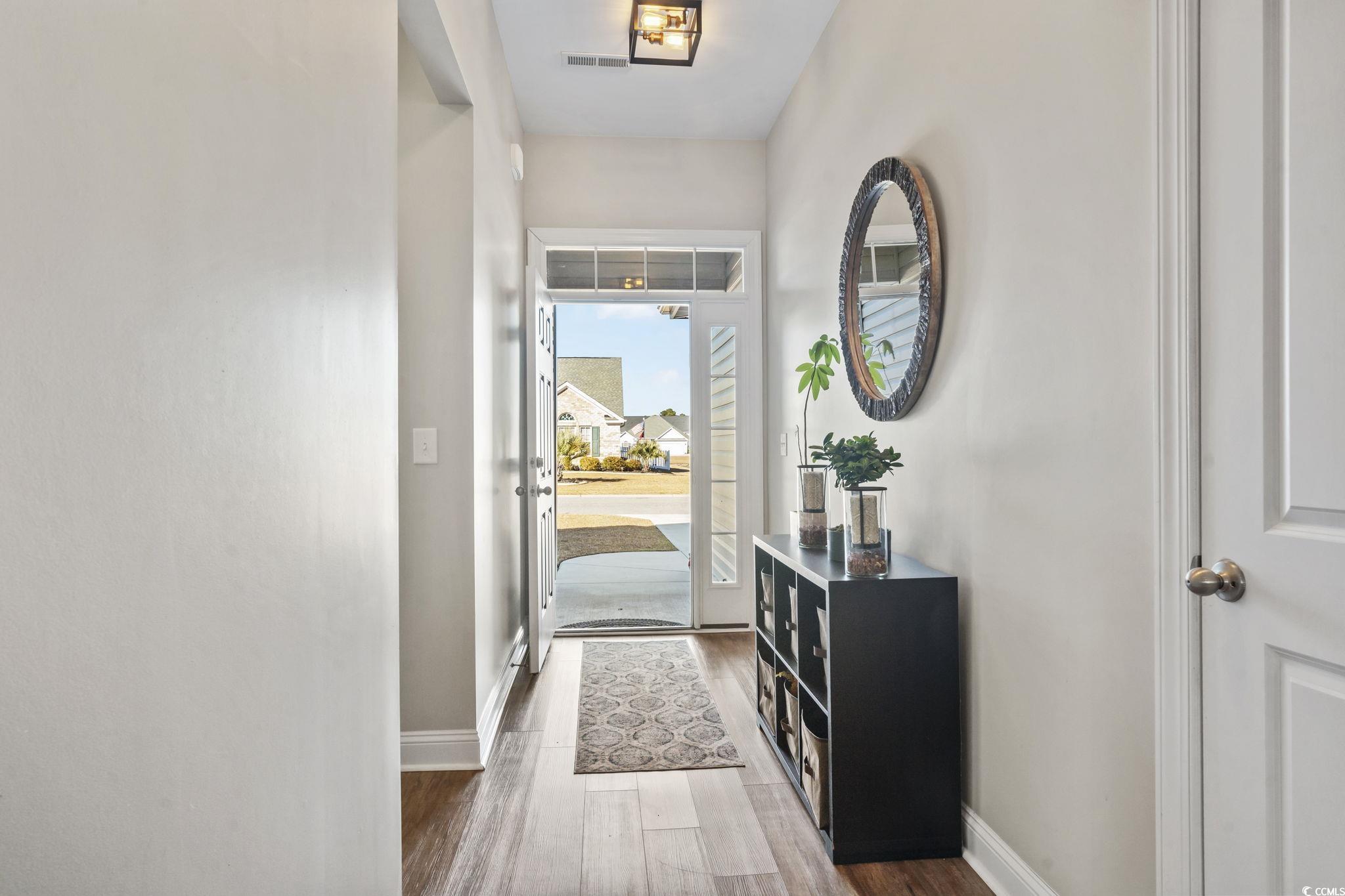 308 Turning Pines Loop Myrtle Beach, SC 29579 - Photo 2 of 33 Foyer with dark hardwood / wood-style flooring