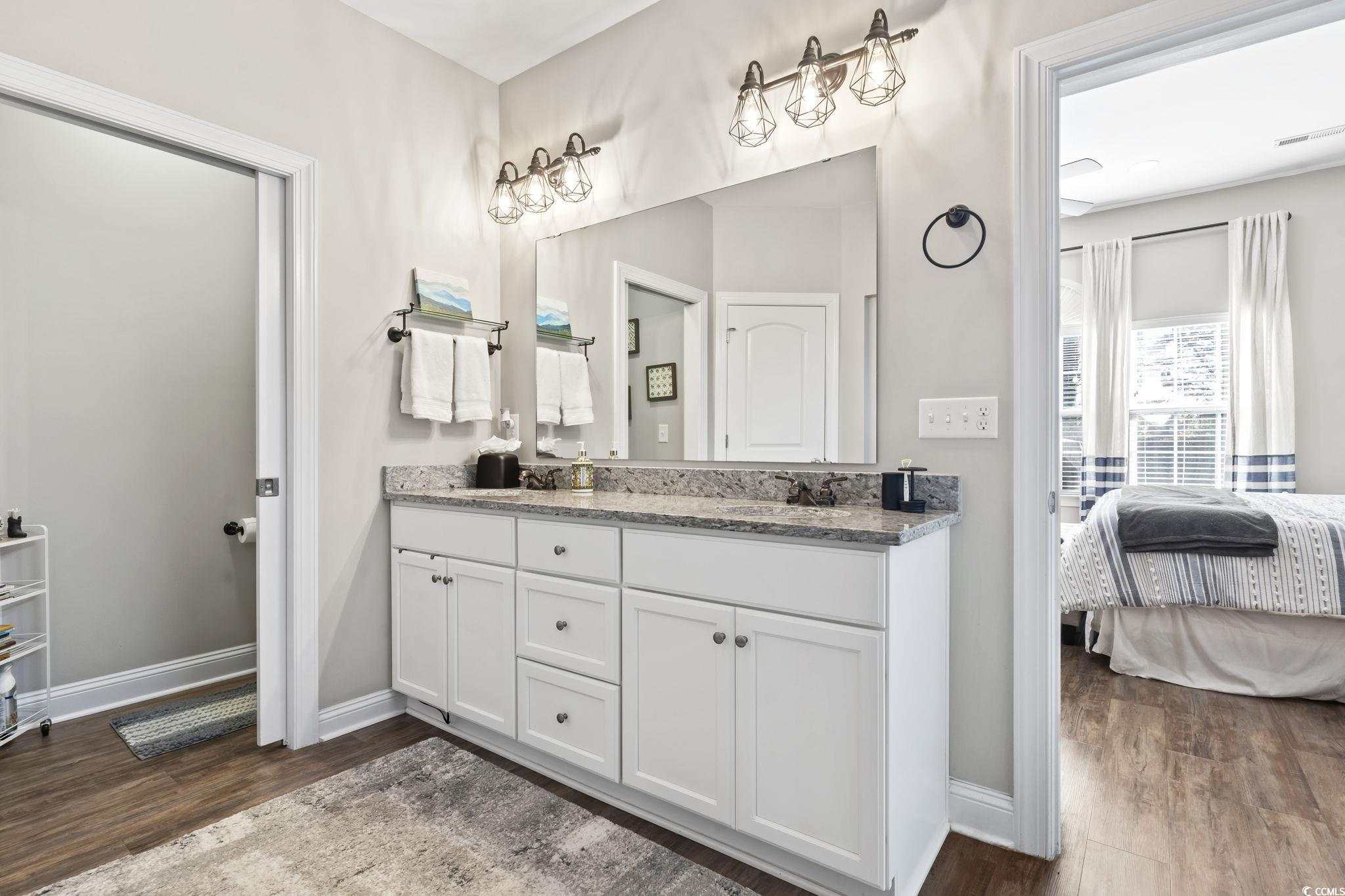 308 Turning Pines Loop Myrtle Beach, SC 29579 - Photo 21 of 33 Bathroom featuring hardwood / wood-style flooring