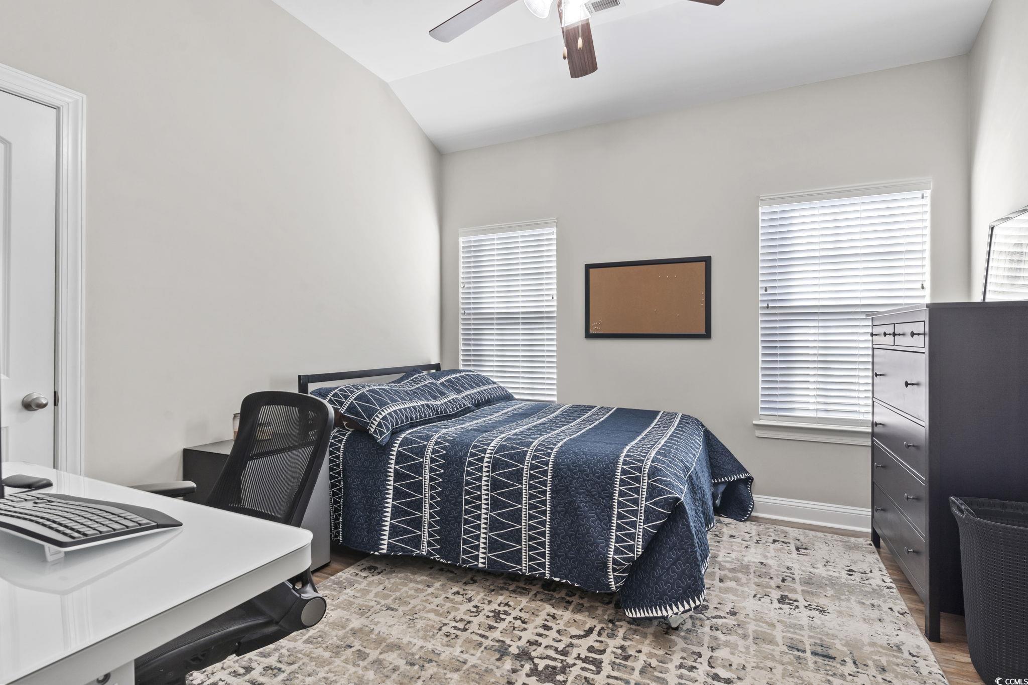 308 Turning Pines Loop Myrtle Beach, SC 29579 - Photo 22 of 33 Bedroom featuring ceiling fan, multiple windows, h